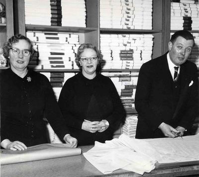 One male and two female employees in the Linen Department, JF Rockhey Ltd
